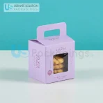 Small cookie boxes with windows. They show the cookies inside. Perfect for gifts or selling cookies.